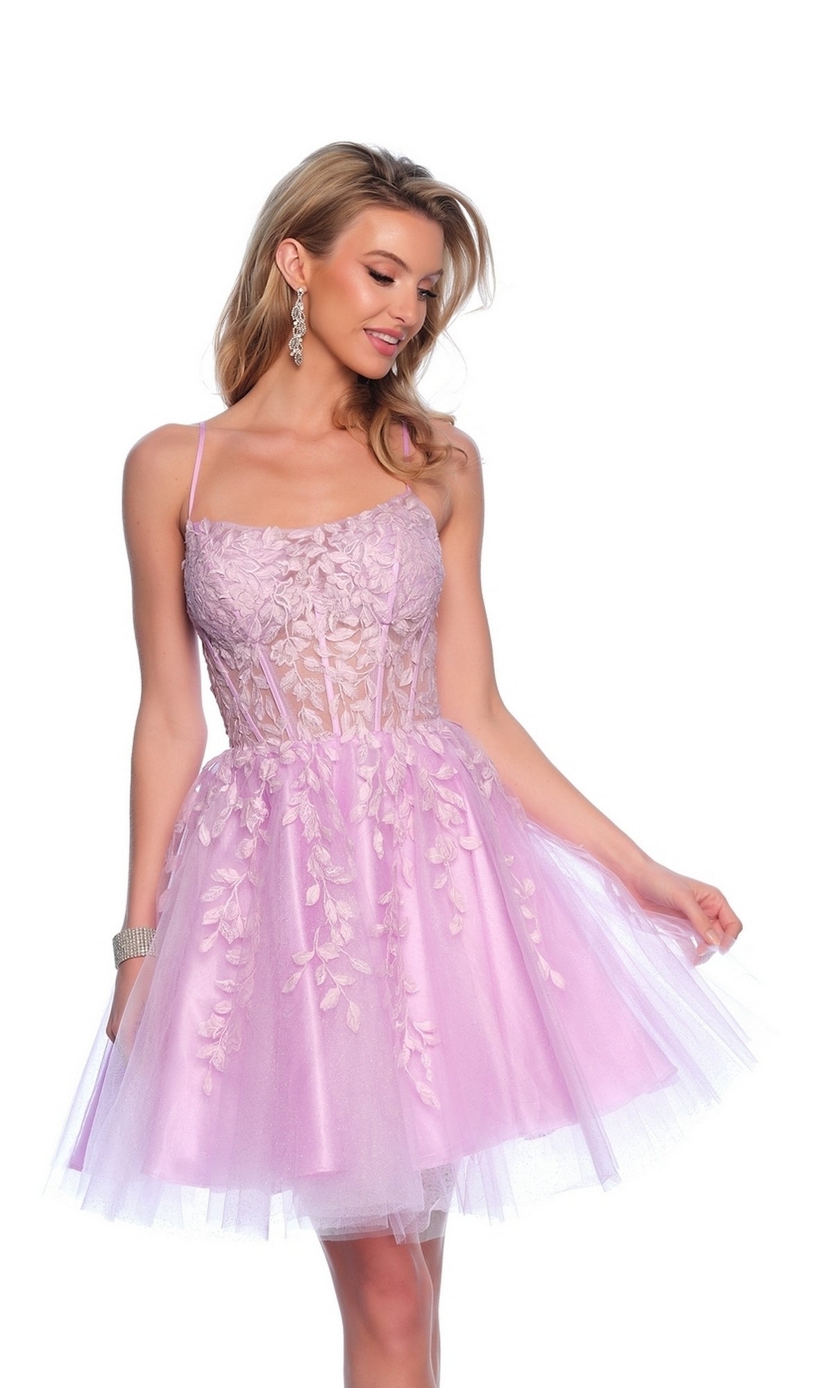 Woman wearing the Dave & Johnny 11750 purple homecoming dress, a sleeveless fit-and-flare style with floral embroidery and tulle skirt, accessorized with drop earrings and a bracelet.